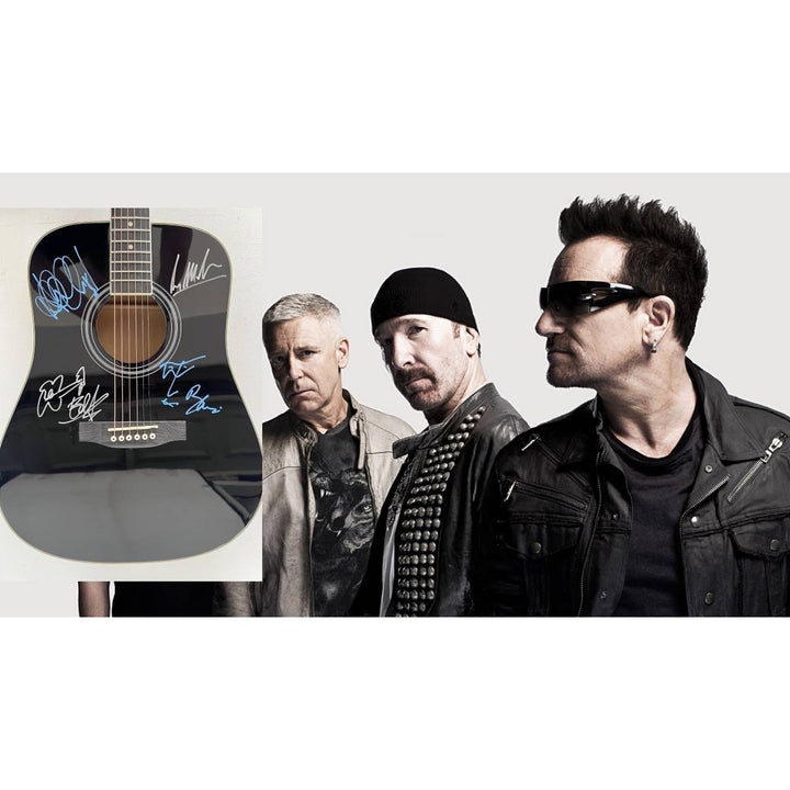 U2 Irish rock band Bono, the Edge, Adam Clayton, and Larry Mullen Jr. full size acoustic guitar signed with proof.