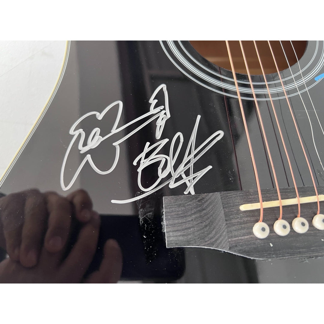 U2 Irish rock band Bono, the Edge, Adam Clayton, and Larry Mullen Jr. full size acoustic guitar signed with proof.