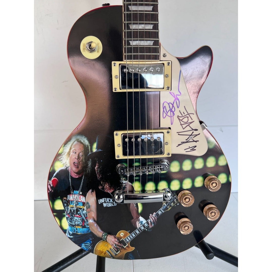 Guns N' Roses Saul Hudson "Slash" and W. Axl Rose Rose one of a kind vintage les paul signed with proof.
