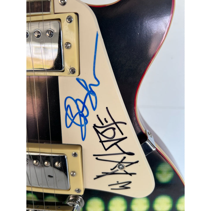 Guns N' Roses Saul Hudson "Slash" and W. Axl Rose Rose one of a kind vintage les paul signed with proof.