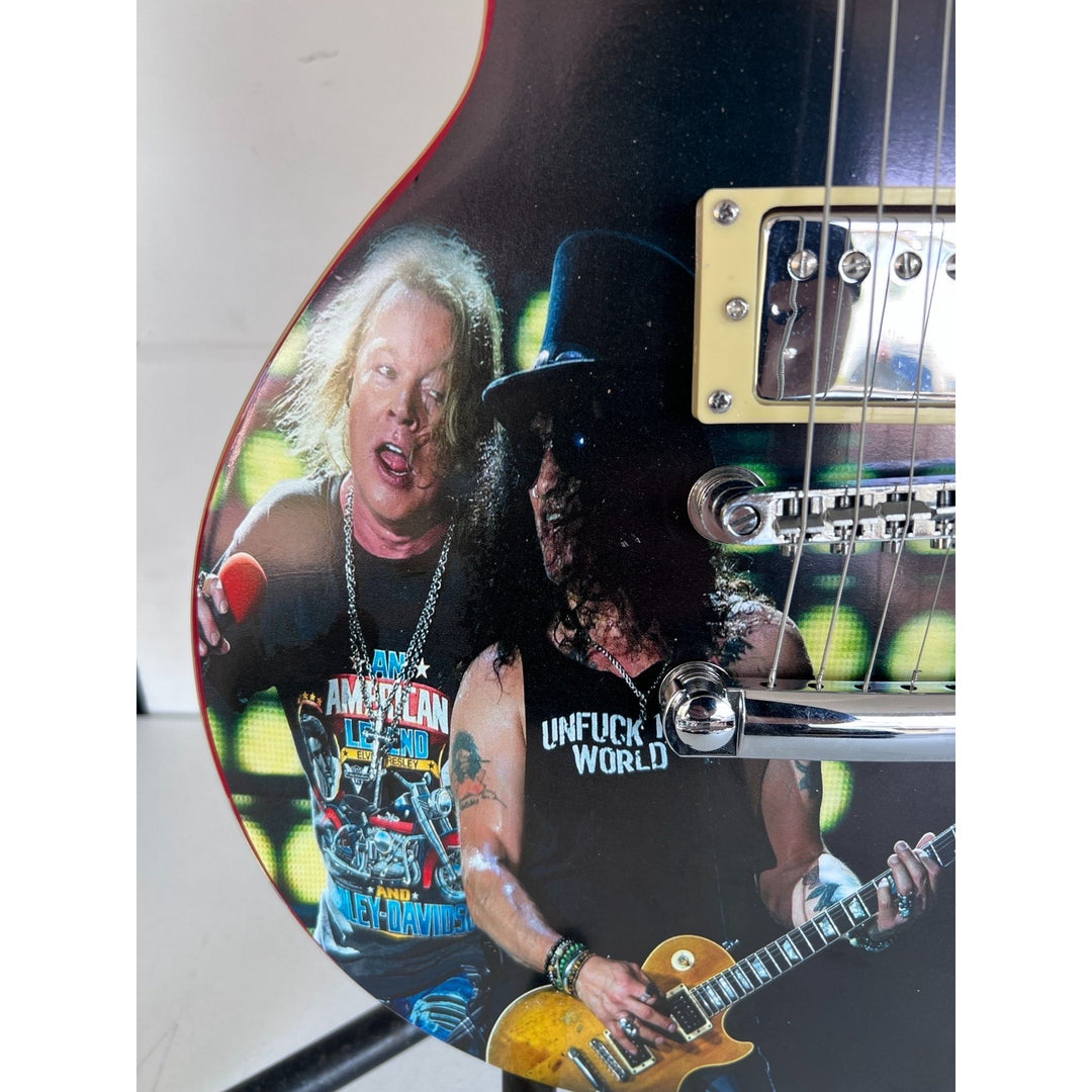 Guns N' Roses Saul Hudson "Slash" and W. Axl Rose Rose one of a kind vintage les paul signed with proof.