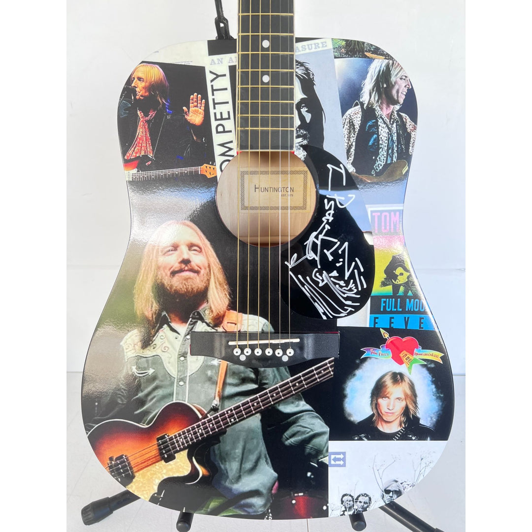 Tom Petty one of a kind full size acoustic guitar signed with proof and Tom added a sketch