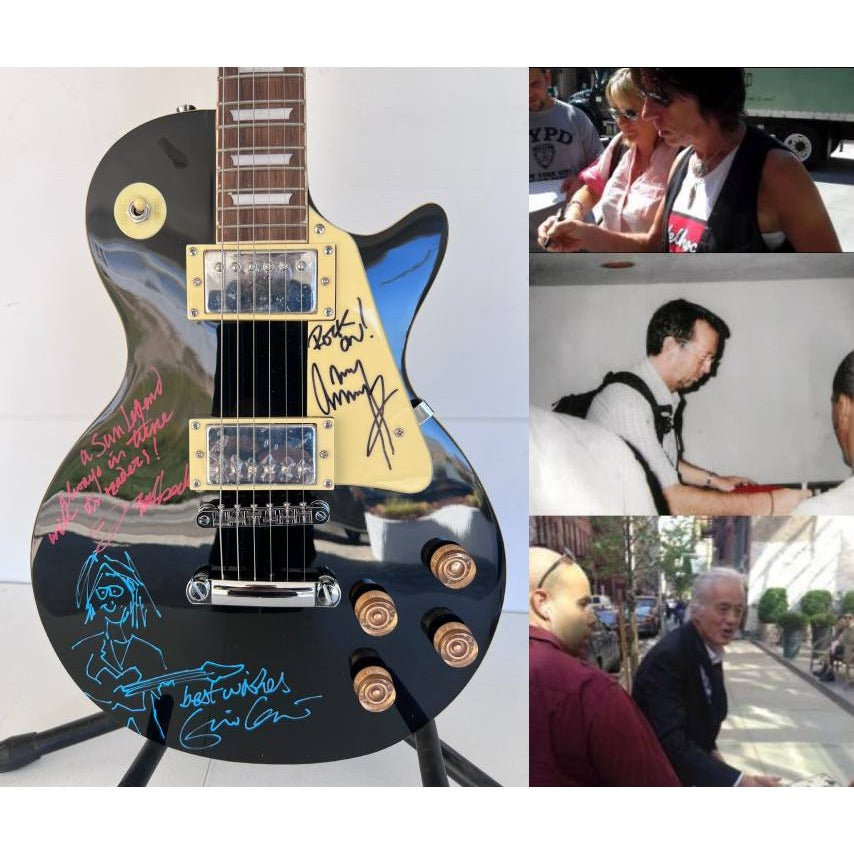 The  Yardbirds Jimmy Page Eric Clapton & Jeff Beck vintage black Les Paul Electric Guitar signed with proof..