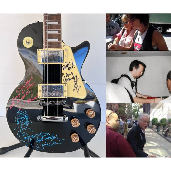 The  Yardbirds Jimmy Page Eric Clapton & Jeff Beck vintage black Les Paul Electric Guitar signed with proof..