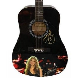 "Shakira" Mebarak Ripoll Columbian musician full size acoustic guitar signed with proof.