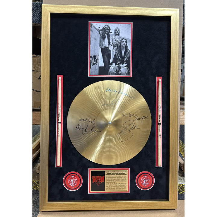 Rush 12' Cymbal signed Neil Peart, Geddy Lee, Alex Lifeson with a museum quality frame 25x 37