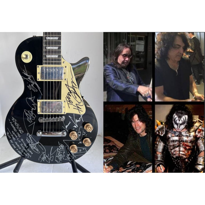 Kiss Gene Simmons, Paul Stanley, Ace Frehley, Peter Criss, Tommy Thayer, Eric Singer and Bruce Kulick Les Paul electric guitar signed with p