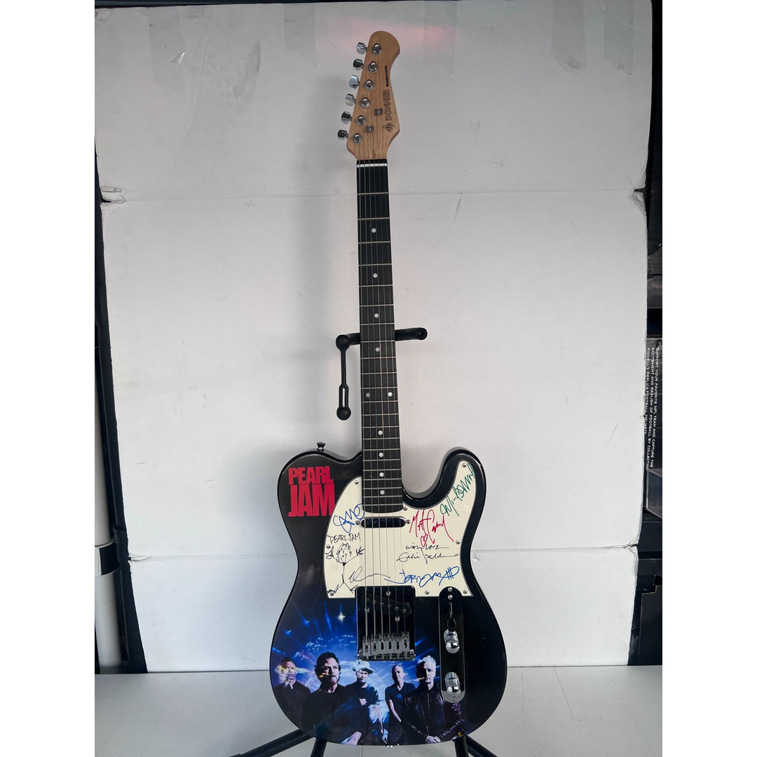 Pearl Jam Eddie Vedder Jeff Ament Stone Gossard Mike McCready Matt Cameron full size electric guitar signed with proof.
