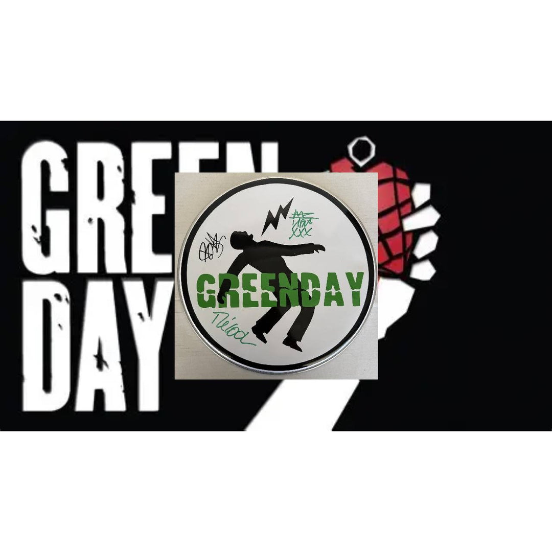 Green Day Billie Joe Armstrong Tré Cool 10-in one-of-a-kind drumhead signed with proof.