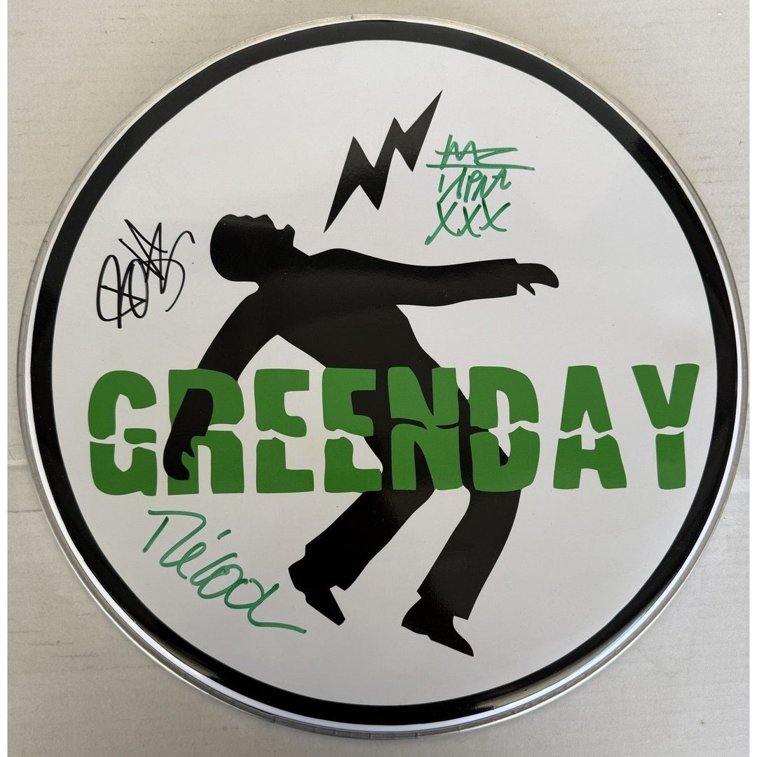 Green Day Billie Joe Armstrong Tré Cool 10-in one-of-a-kind drumhead signed with proof.