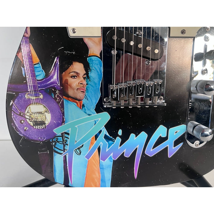 Prince Rogers Nelson one of a kind telecaster full size electric guitar signed with proof.