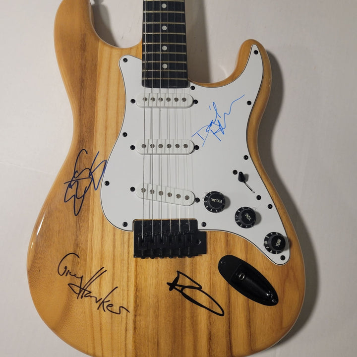 The Cars Ric Ocasek, Benjamin Orr, Elliot Easton, Greg Hawkes, vintage wood grain stratocaster electric guitar signed with proof Awesome Artifacts