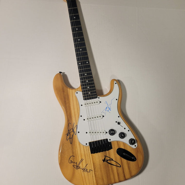 The Cars Ric Ocasek, Benjamin Orr, Elliot Easton, Greg Hawkes, vintage wood grain stratocaster electric guitar signed with proof Awesome Artifacts