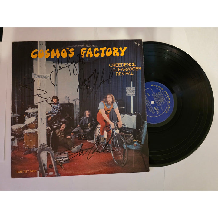 Tom and John Fogarty Stu Cook dog Clifford Cosmos Factory original LP signed with proof.