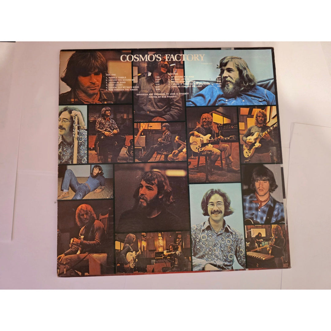 Tom and John Fogarty Stu Cook dog Clifford Cosmos Factory original LP signed with proof.