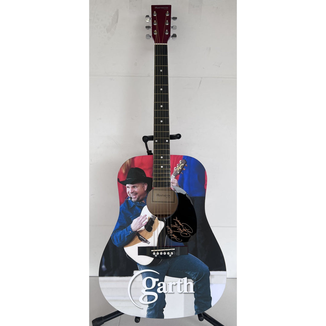 Garth Brooks full size acoustic guitar (one of a kind ) signed with proof.