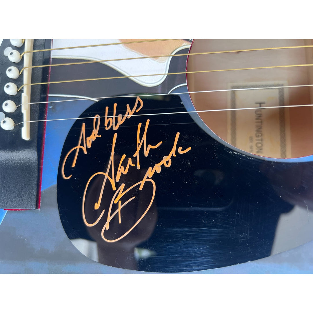 Garth Brooks full size acoustic guitar (one of a kind ) signed with proof.