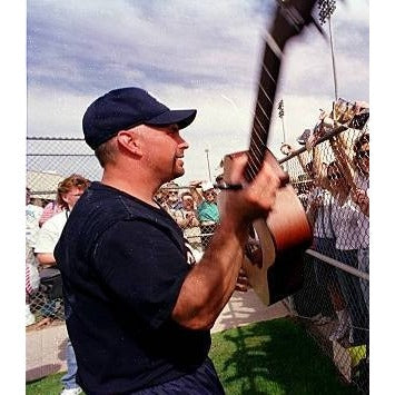 Garth Brooks full size acoustic guitar (one of a kind ) signed with proof.