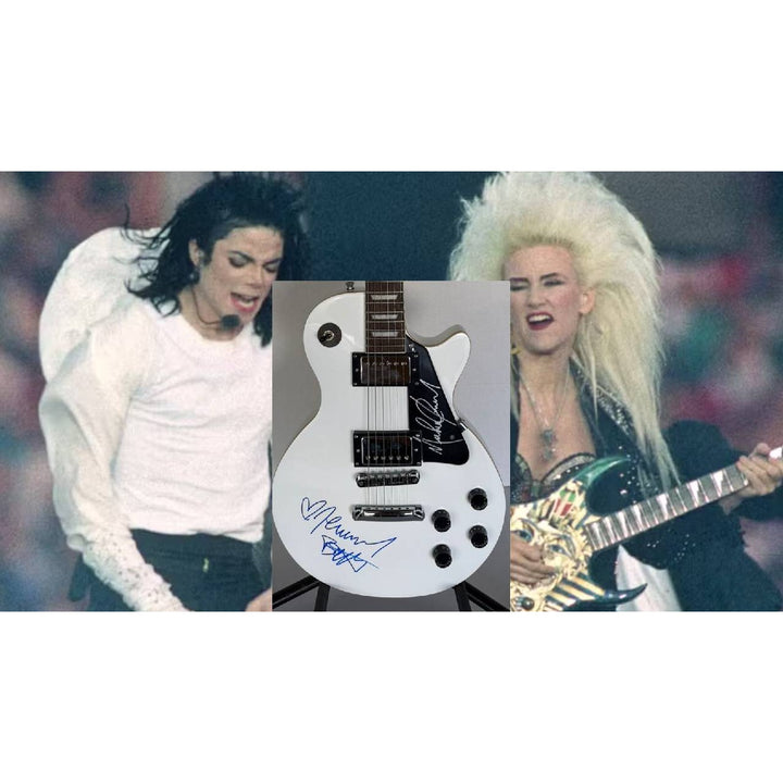 Michael Jackson and Jennifer Batten les paul electric guitar signed with proof.