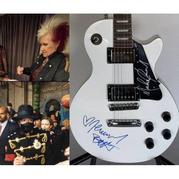 Michael Jackson and Jennifer Batten les paul electric guitar signed with proof.