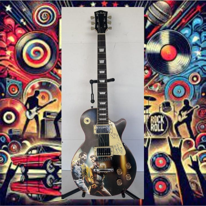 Freddie Mercury and David Bowie one of a kind les paul (full size) electric guitar signed with proof.