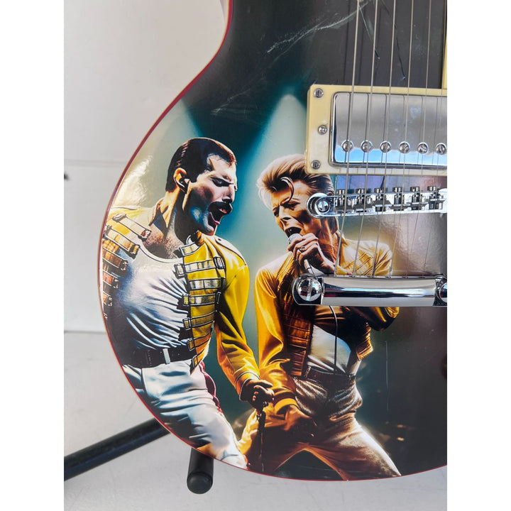 Freddie Mercury and David Bowie one of a kind les paul (full size) electric guitar signed with proof.