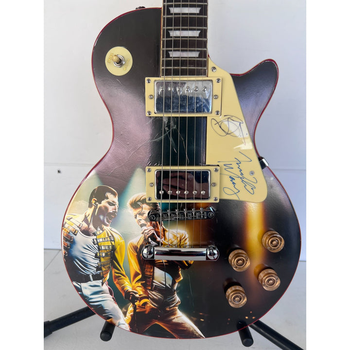 Freddie Mercury and David Bowie one of a kind les paul (full size) electric guitar signed with proof.