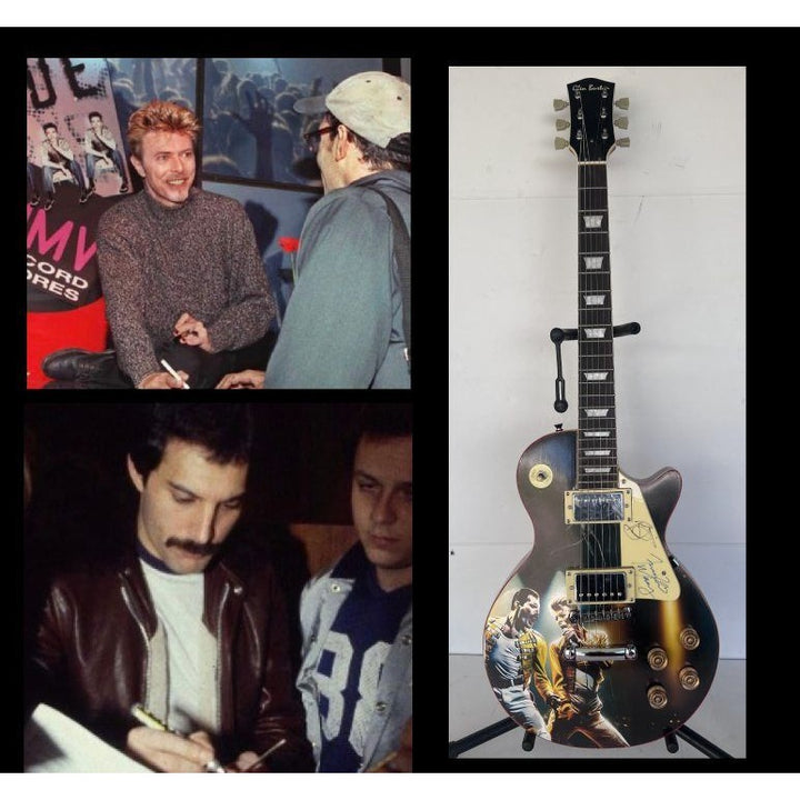 Freddie Mercury and David Bowie one of a kind les paul (full size) electric guitar signed with proof.