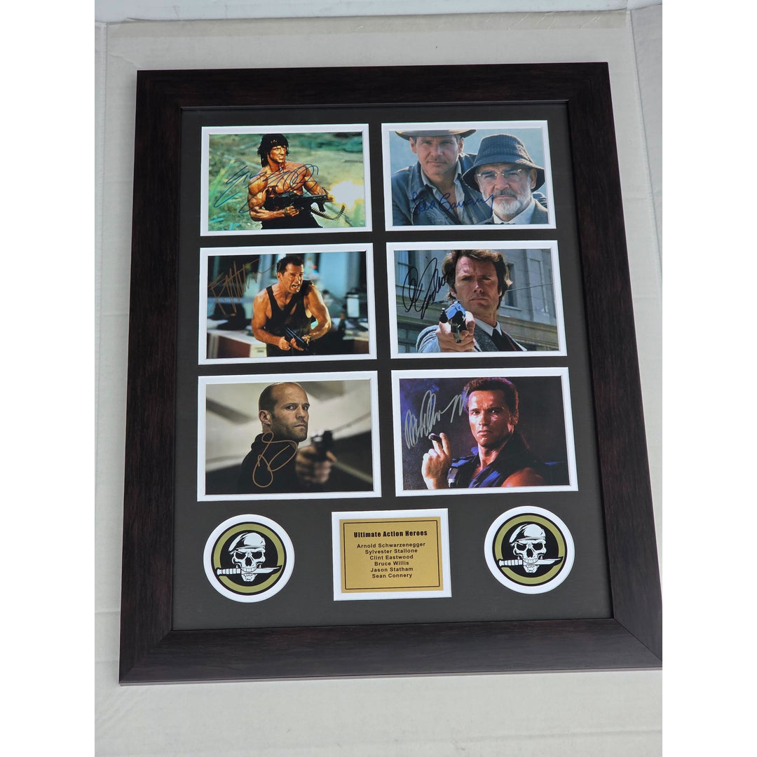 Arnold Schwarzenegger, Sylvester Stallone , Clint Eastwood, Bruce Willis , Clint Eastwood action heroes framed with proof.
