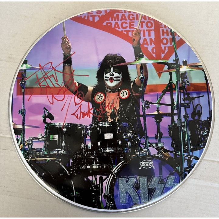 Eric Singer Kiss iconic drummer drumhead signed with proof.
