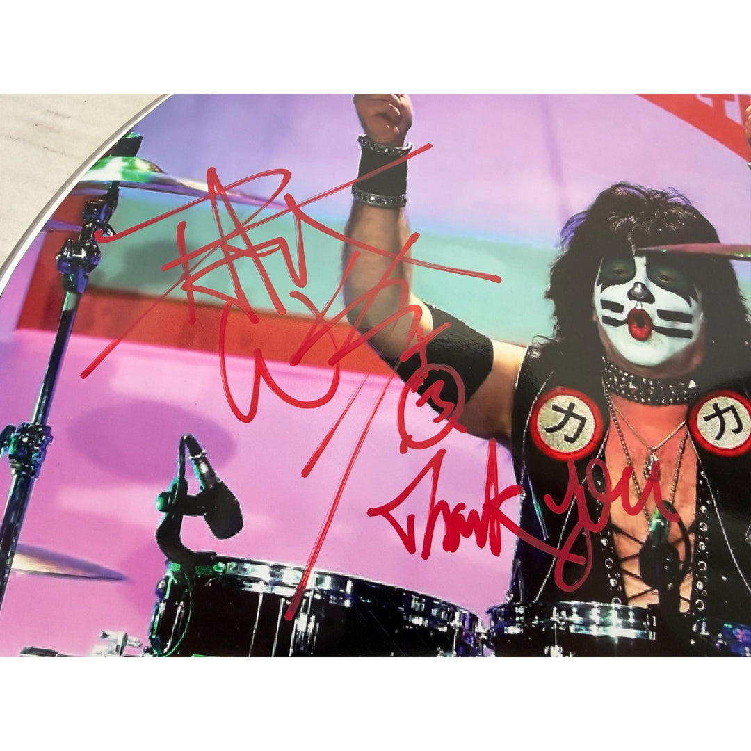 Eric Singer Kiss iconic drummer drumhead signed with proof.