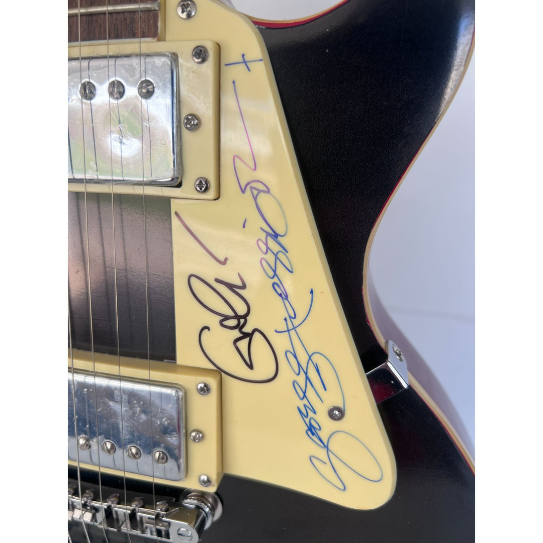 George Harrison and Eric Clapton  one of a kind les paul (full size) electric guitar signed with proof.
