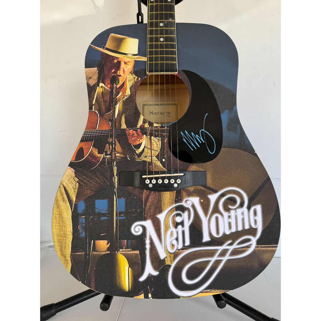 Neil Young  full size one of a kind acoustic guitar signed with proof.