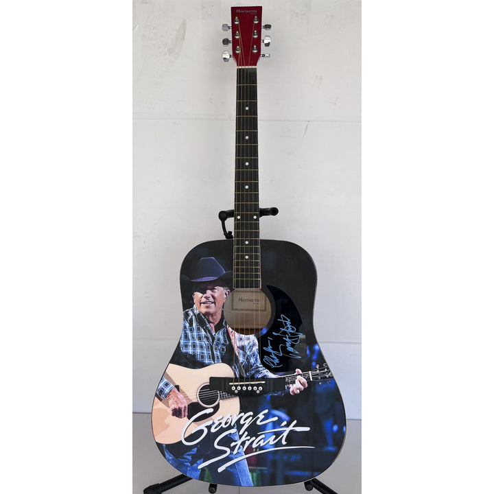 George Strait  full size acoustic guitar (one of a kind ) signed with proof.