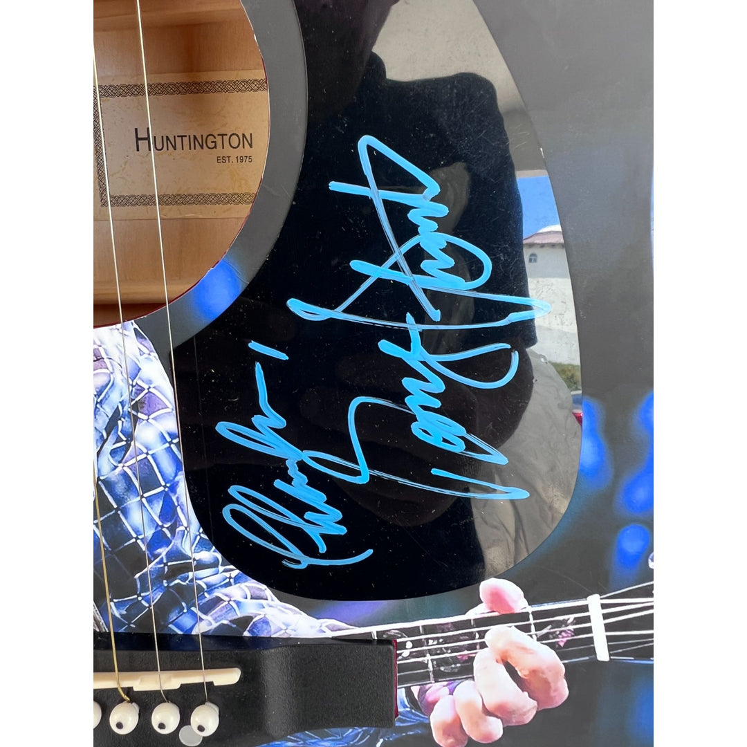 George Strait  full size acoustic guitar (one of a kind ) signed with proof.