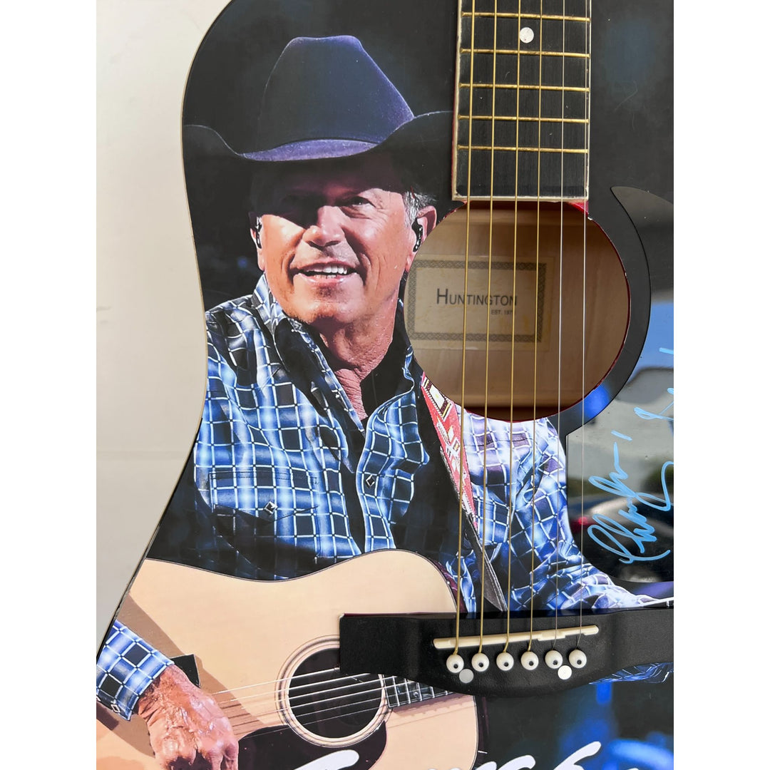 George Strait  full size acoustic guitar (one of a kind ) signed with proof.