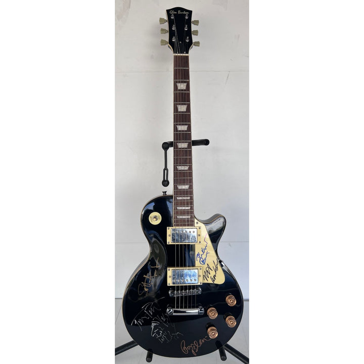 Tom Petty signed with sketch and the Heartbreakers vintage les paul full size electric guitar signed with proof.