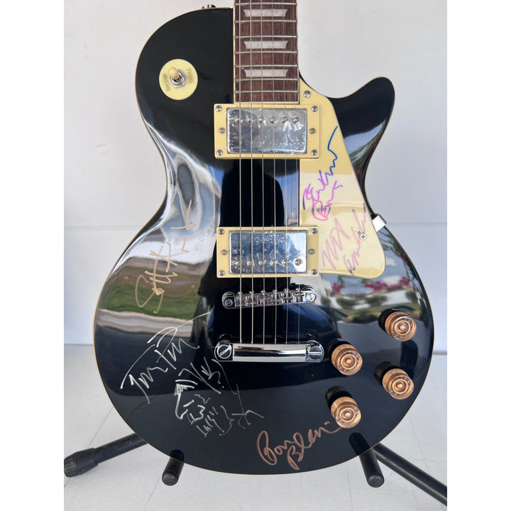 Tom Petty signed with sketch and the Heartbreakers vintage les paul full size electric guitar signed with proof.