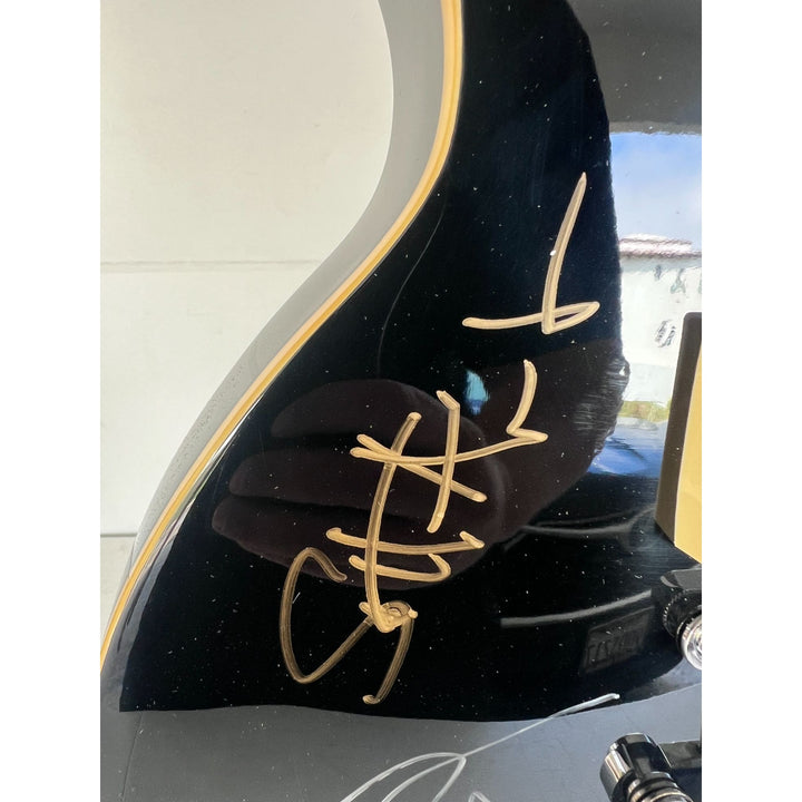 Tom Petty signed with sketch and the Heartbreakers vintage les paul full size electric guitar signed with proof.