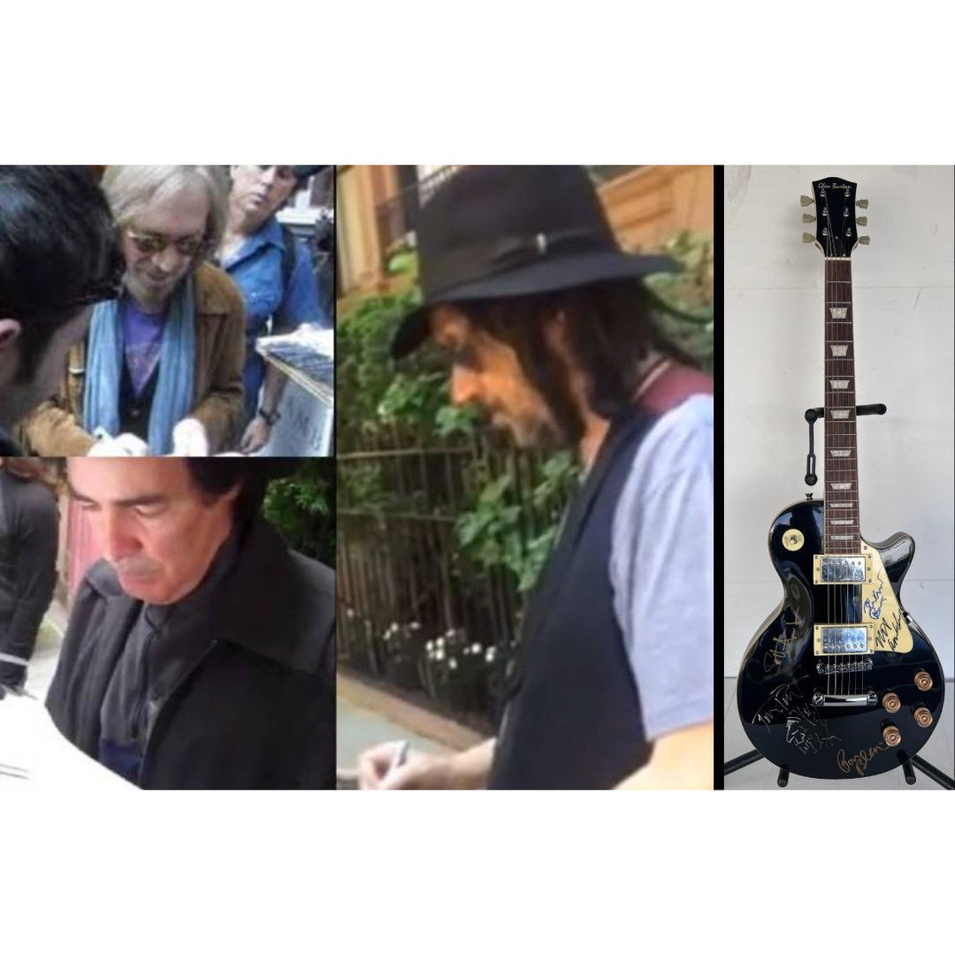 Tom Petty signed with sketch and the Heartbreakers vintage les paul full size electric guitar signed with proof.