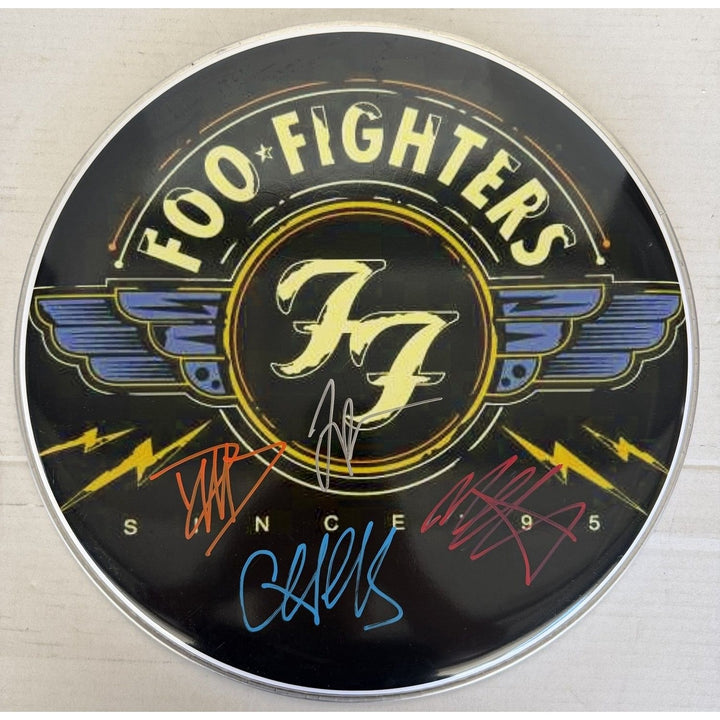 David Grohl Taylor Hawkins Foo Fighters drumhead signed with proof.