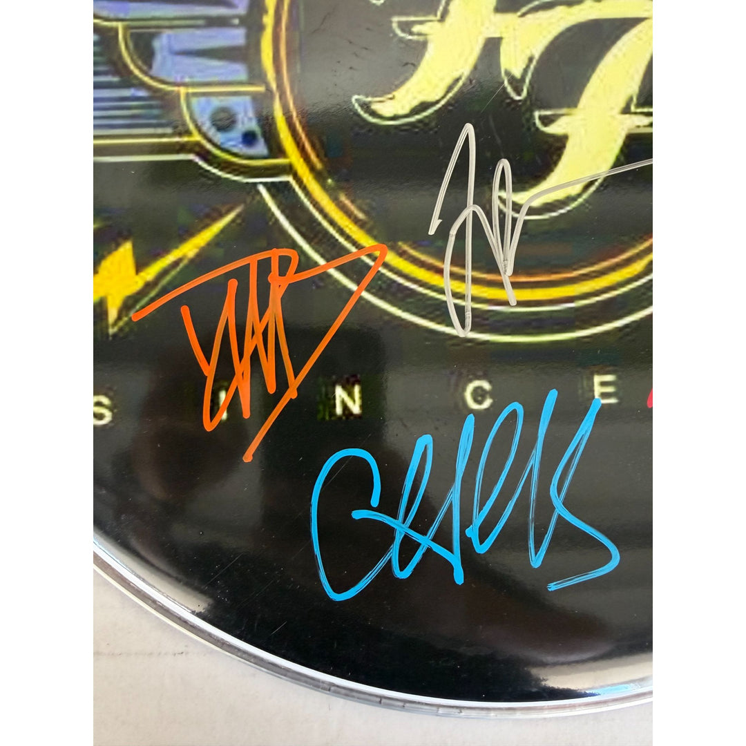 David Grohl Taylor Hawkins Foo Fighters drumhead signed with proof.