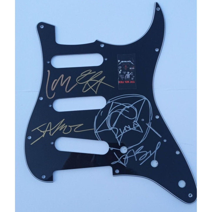 Metallica  James Hetfield, Kirk Hammett, Lars Ulrich, Jason Newsted Metallica guitar pickguard signed with proof