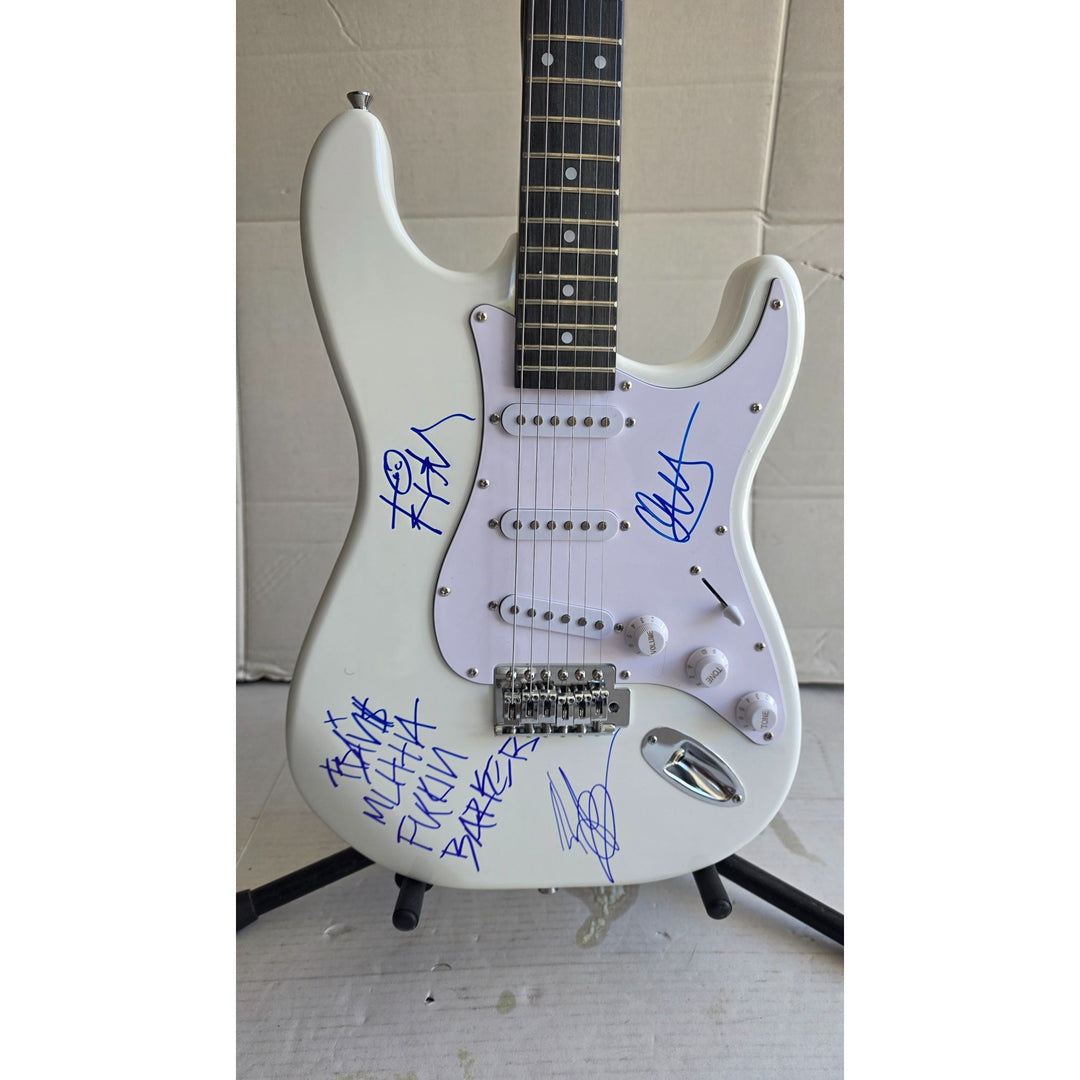 Travis Barker, Mark Hoppus, Tom De Longe, Blink 182, authentic Fender Stratocaster electric guitar signed with proof.