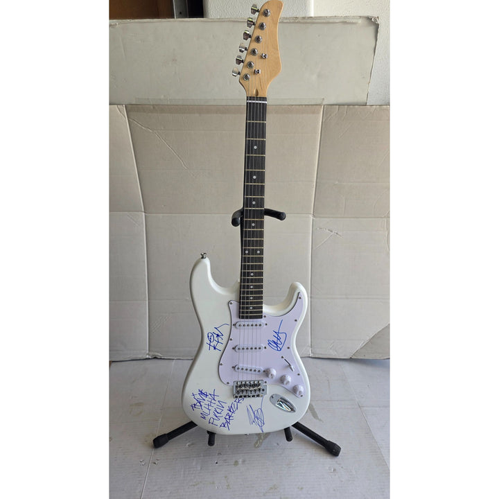 Travis Barker, Mark Hoppus, Tom De Longe, Blink 182, authentic Fender Stratocaster electric guitar signed with proof.