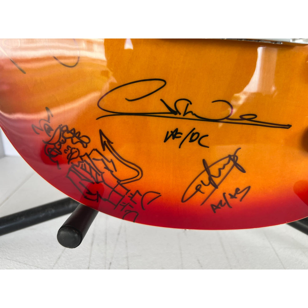 ACDC Angus Young, Malcolm Young, Phil Rudd, Brian Johnston, Cliff Williams les paul electric guitar signed with proof
