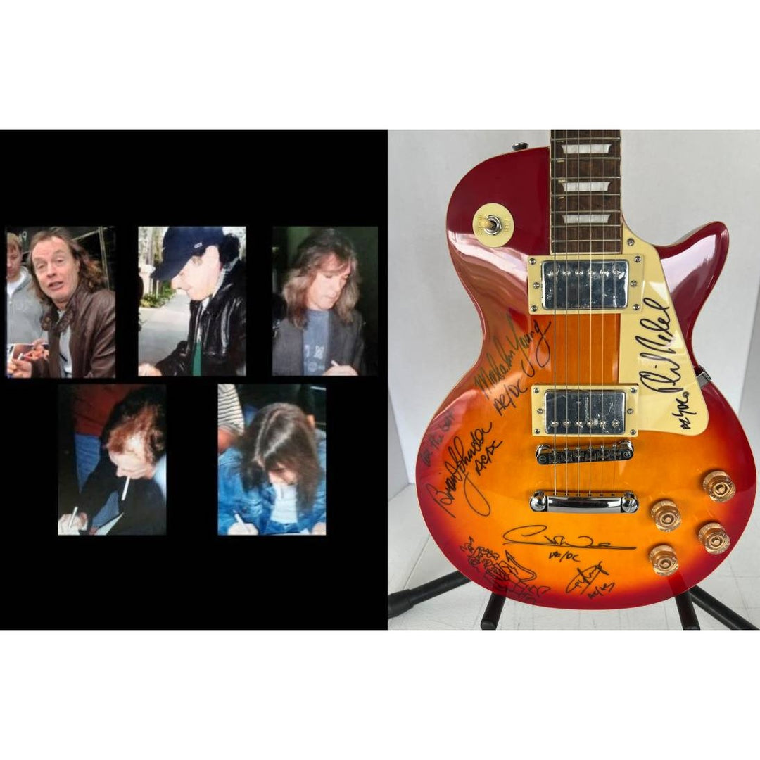 ACDC Angus Young, Malcolm Young, Phil Rudd, Brian Johnston, Cliff Williams les paul electric guitar signed with proof