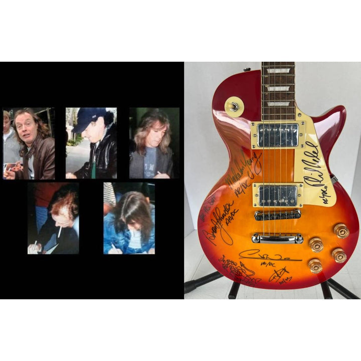 ACDC Angus Young, Malcolm Young, Phil Rudd, Brian Johnston, Cliff Williams les paul electric guitar signed with proof