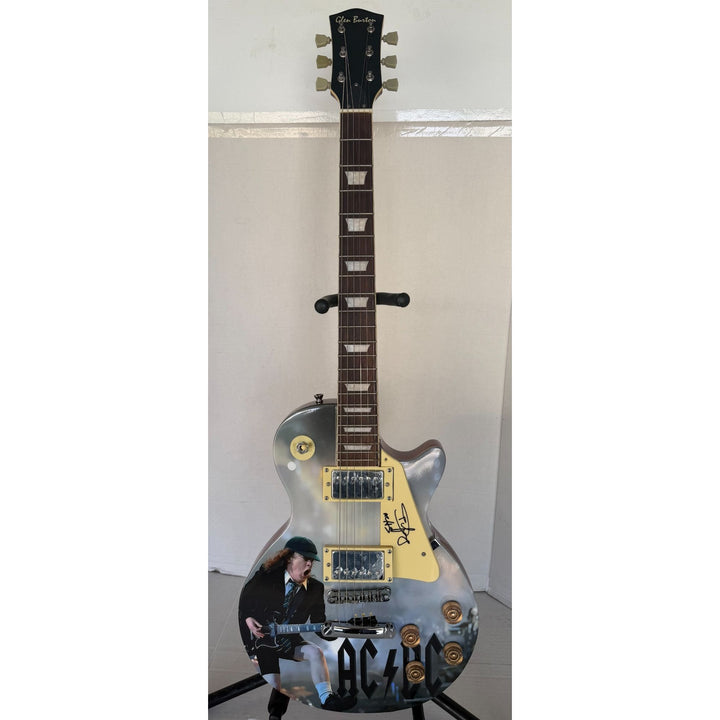 Angus Young AC/DC One of a Kind full size les paul electric guitar signed with proof.