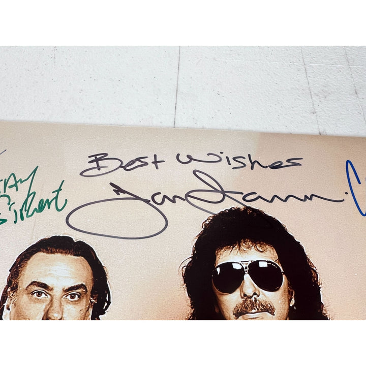 Ozzy Osbourne, Tony Iommi, Geezer Butler, Bill Ward Black Sabath vintage 11x14 photo signed with proof.